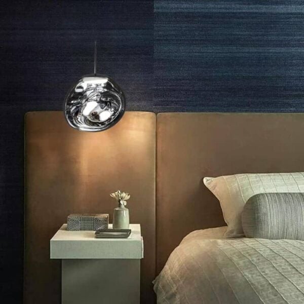 Suspension luminaire asymétrique aux courbes fluides